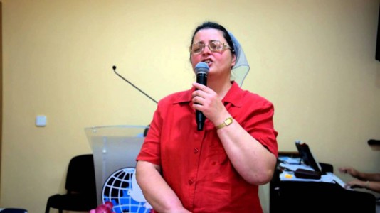 Olga Serban - Mergeti Vestiti